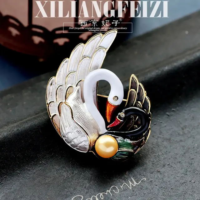 Enamel painted black and white swan brooch Gold - Shop at LoveMi