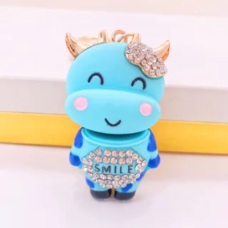 Zodiac Creative Metal Rhinestone Resin Smile Cow Car Keychain Pendant - Blue