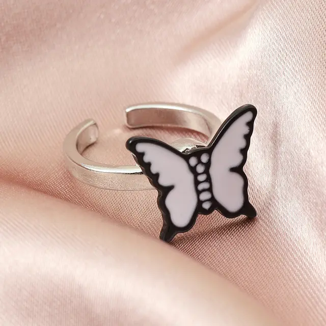 Fashion The Same Sweet Butterfly Revolving Ring White Butterfly - Shop at LoveMi