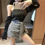 One Piece Of Plaid Shorts