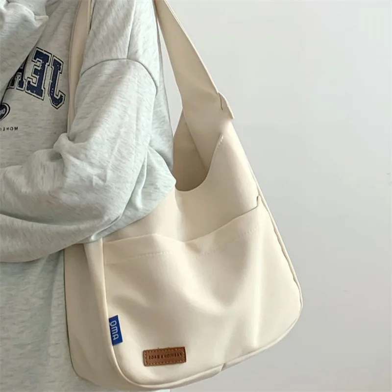 Fashion Casual Embroidered Tooling Canvas Messenger Bag - Beige