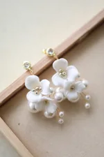 A Pair Of Gold Earrings