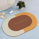 Orange Oval Floor Mat