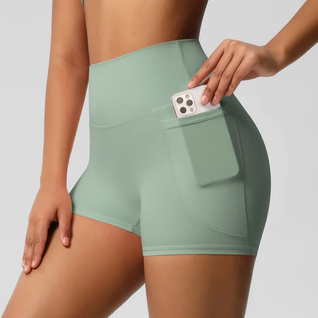 Brushed Solid Color Pocket High Waist Tight High Elastic Yoga Shorts Basil Green - Shop at LoveMi