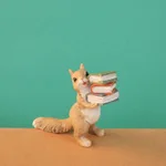 Squirrel Holding Books