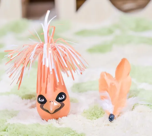 Toy feathers turn tumbler - Orange